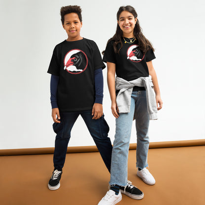 A boy and girl wearing Blue Aster Studio turkey vulture t-shirts.