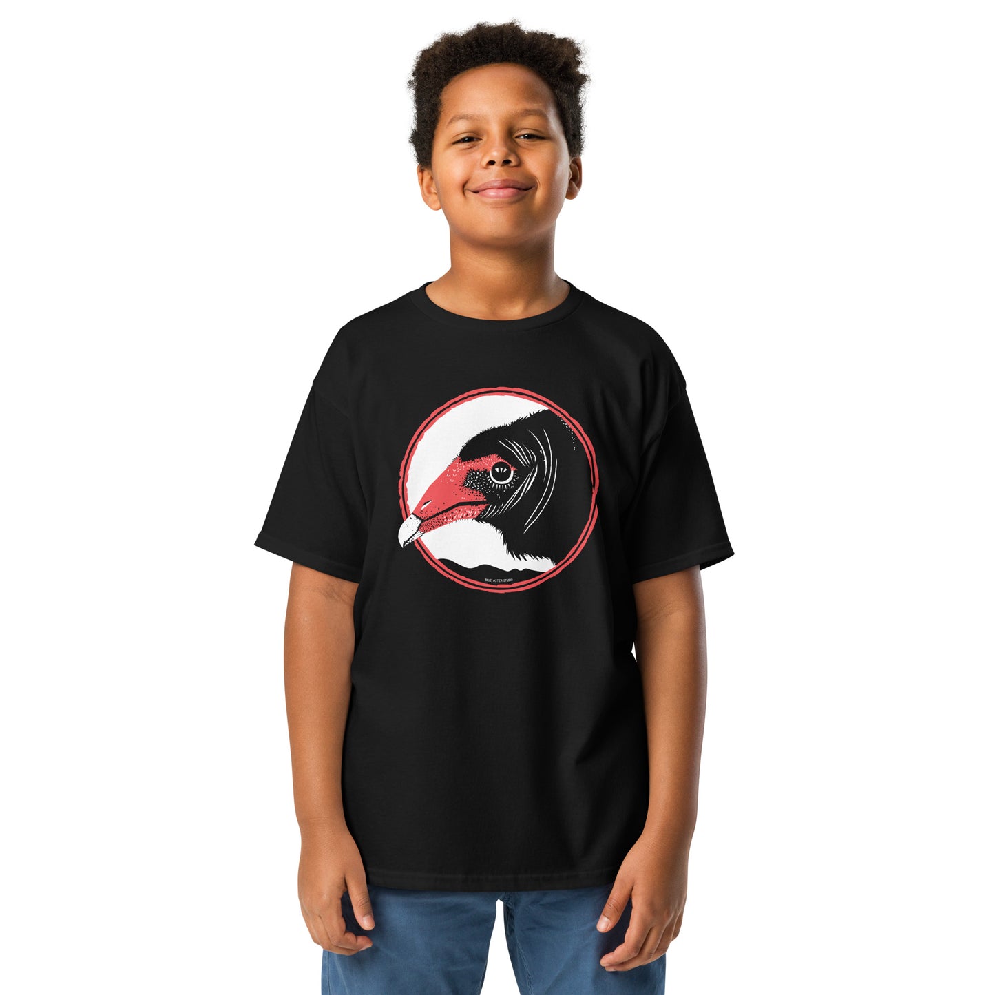 A young boy wearing the turkey vulture t-shirt.