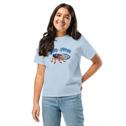 A young girl modeling the cicada t-shirt in light blue.
