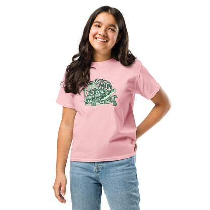 A girl modeling a pink box turtle tee.