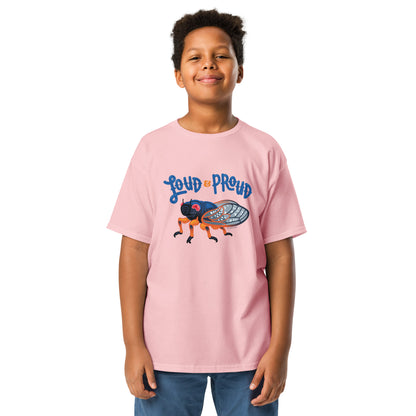 A young boy modelling the pink cicada tee
