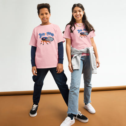Two children wearing pink cicada tee shirts.
