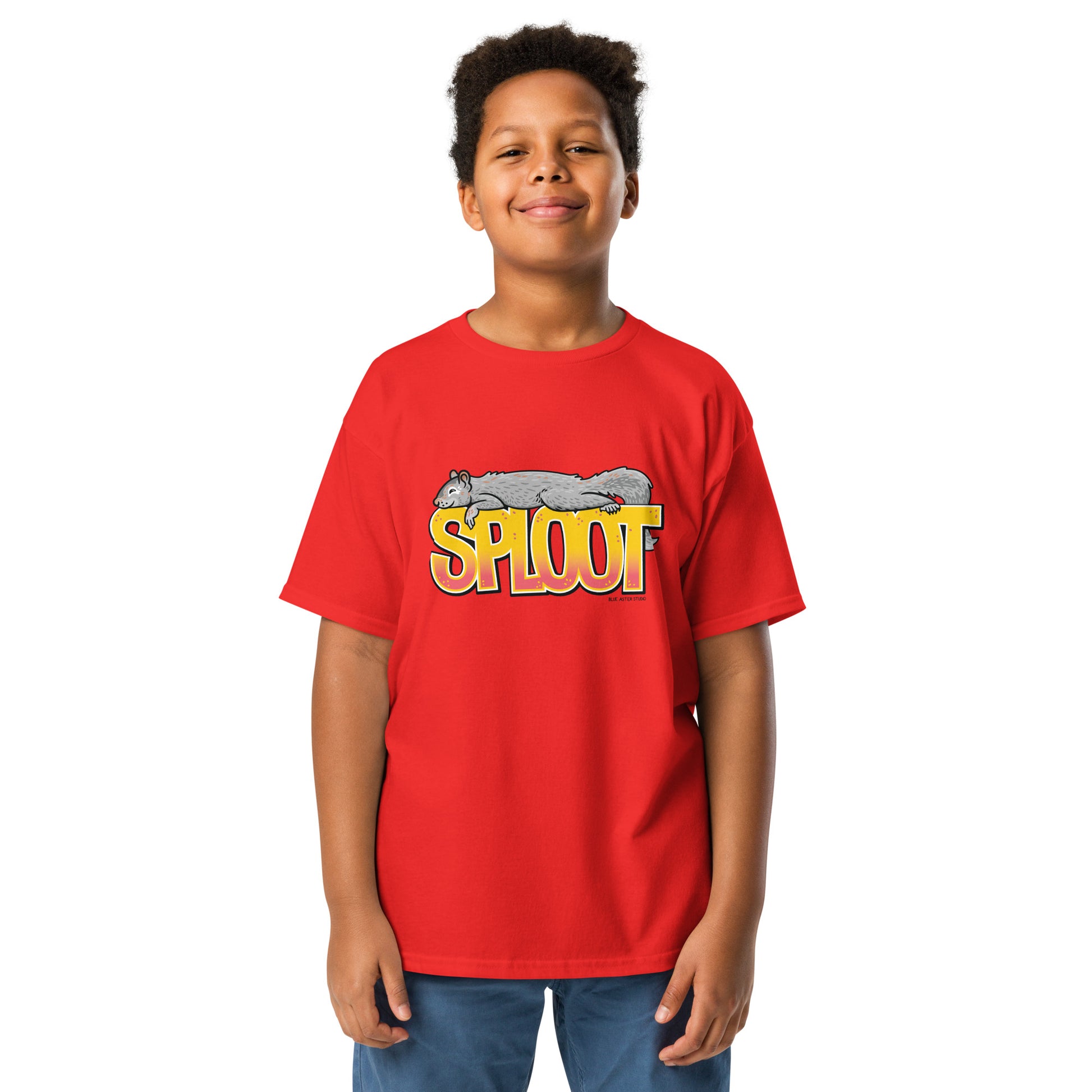 A young boy modeling the squirrel sploot short-sleeved youth tshirt in red.
