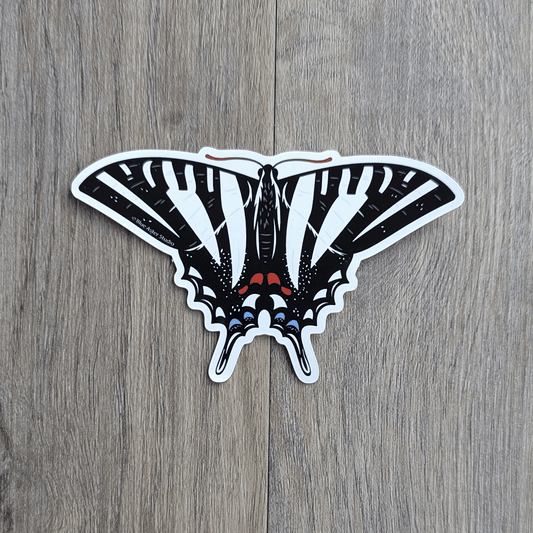 A black and white swallowtail butterfly sticker.