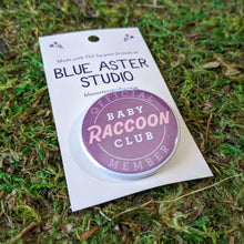 Load image into Gallery viewer, A close up of the Baby Raccoon Club button.