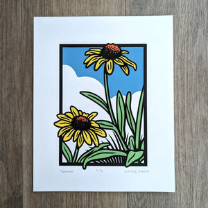 A handmade screen print of Black eyed Susan or Rudbeckia hirta, a native plant in central and eastern North America