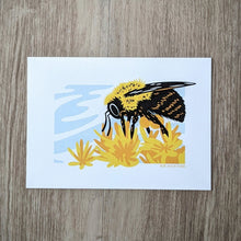Load image into Gallery viewer, A 5x7 art print of an illustration of a bumblebee on some yellow and gold flowers.