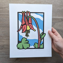 Load image into Gallery viewer, Columbine wildflower screen print being held by a hand in front of a wood background.