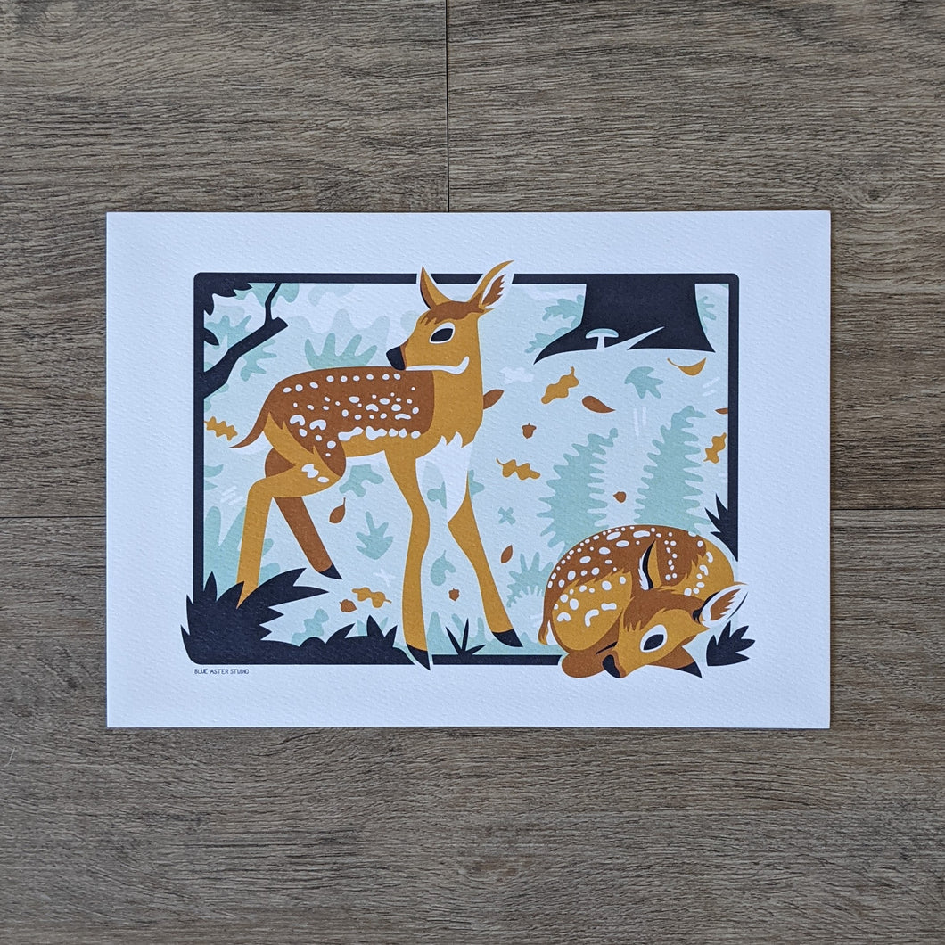 An art print of two fawns in a woodland scene.