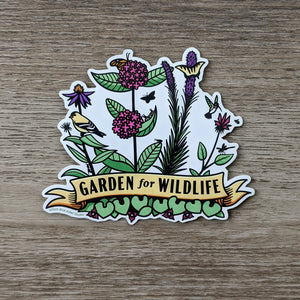 A vinyl sticker with illustrations of native midwestern US plants such as wild ginger, common milkweed, liatris, bee balm, and echinacea with critters all around them including birds, butterflies, and other insects. At the bottome of the sticker there is a banner that reads "Garden For Wildlife"