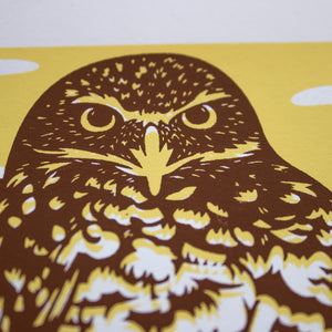 A close-up of the screen print showing just the detail of the burrowing owl's face.