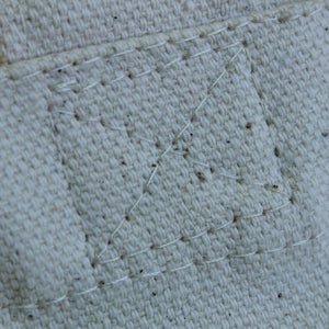 Close up of stitching of the 100% organic cotton monarch tote bag.