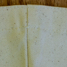 Load image into Gallery viewer, Another close up of the tote bag construction showing the texture and stitching.