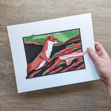 Load image into Gallery viewer, The 8x10 least weasel original screen print held in a hand to help show scale.