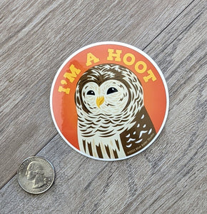 An owl sticker with a USD quarter next to it to show scale.
