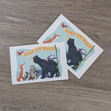 Load image into Gallery viewer, A stack of &quot;Keep Us Wild&quot; postcards with one set off to the side.