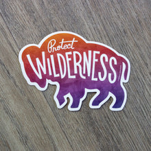Load image into Gallery viewer, A vinyl sticker in the shape of a bison silhouette with the words Protect Wilderness