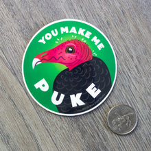 Load image into Gallery viewer, A 3 inch round vinyl sticker with an illustration of a tukey vulture with the words &quot;You Make Me Puke&quot; next to a US quarter for scale.