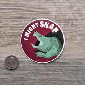 The snapping turtle sticker next to a USD quarter to show scale.