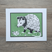 Load image into Gallery viewer, Screen printed art on 8x10 paper. An opossum stands against a green background with an oak leaf and acorn lying near it.